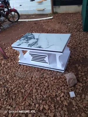 White and Black Center Table With Silver Handle