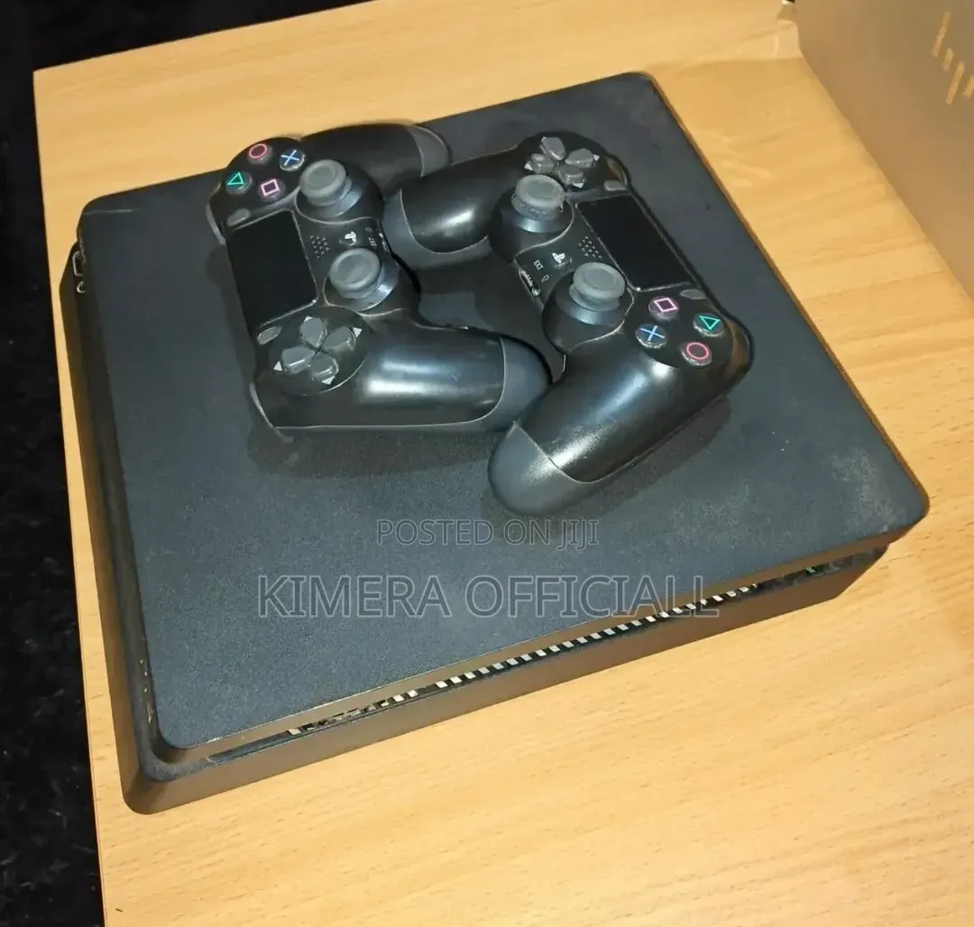 PS4 SLIM 500GB in a Good Condition With 2 Controllers and 12 Games
