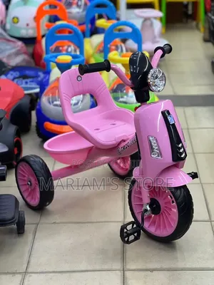 Toddler Tricycle Equipped With Three Wheels, a Molded Plastic Seat,