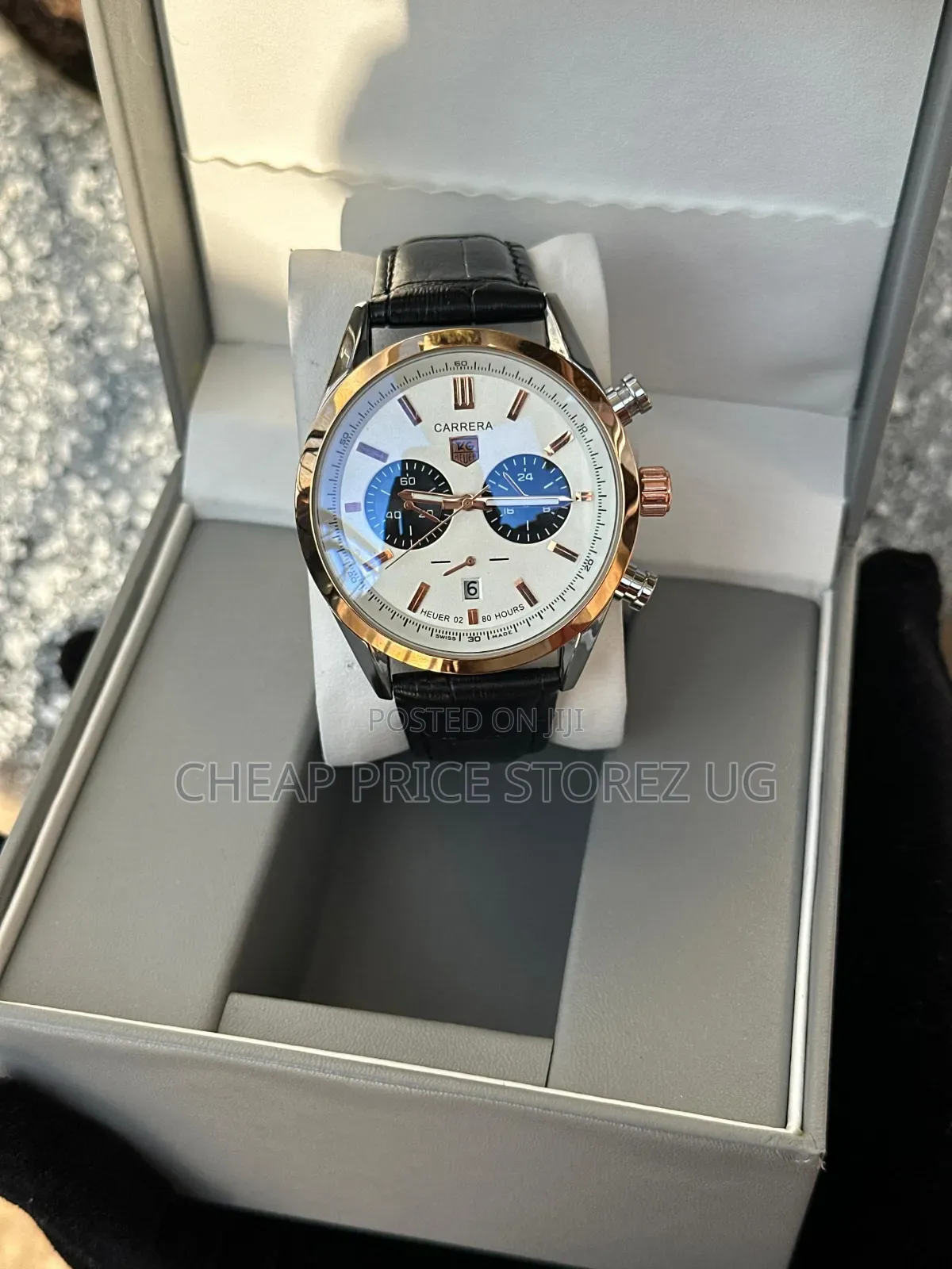 Is a TAG Heuer Carrera Chronograph, Featuring a Rose-Gold-Toned Bezel