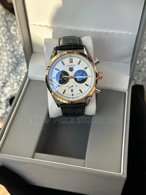 Is a TAG Heuer Carrera Chronograph, Featuring a Rose-Gold-Toned Bezel