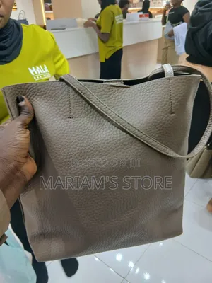 Pebbled Leather Tote Bag Features Slim Shoulder Straps