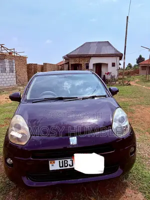 Toyota Passo 1.0 FWD 2012 Burgundy