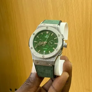 Hublot Geneve Luxury Wristwatch. White Bezel