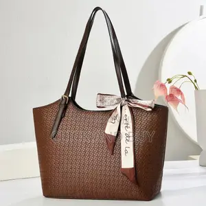 Elegant Textured Brown Tote Bag With Silk Scarf Accent