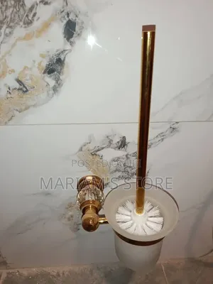 Gold-Finished, Wall-Mounted Toilet Brush With a Frosted Glass Hold