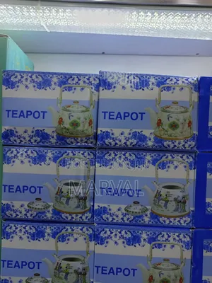 Traditional Porcelain Stovetop Teapot.