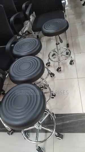 Movable Black Adjustable Rolling Swivel Stool.
