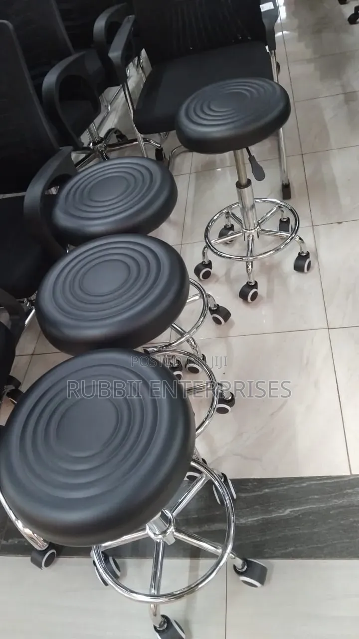 Movable Black Adjustable Rolling Swivel Stool.