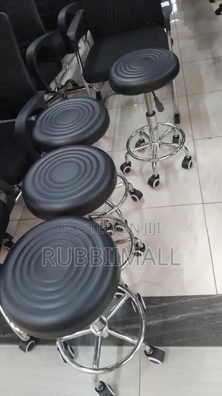 Movable Black Adjustable Rolling Swivel Stool.