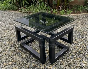 Designer Table, German Quality Ugandan Made, 1cm Glass Top