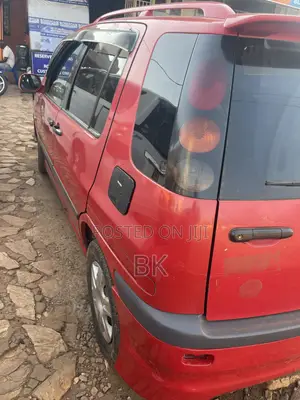 Toyota Raum 2000 Red