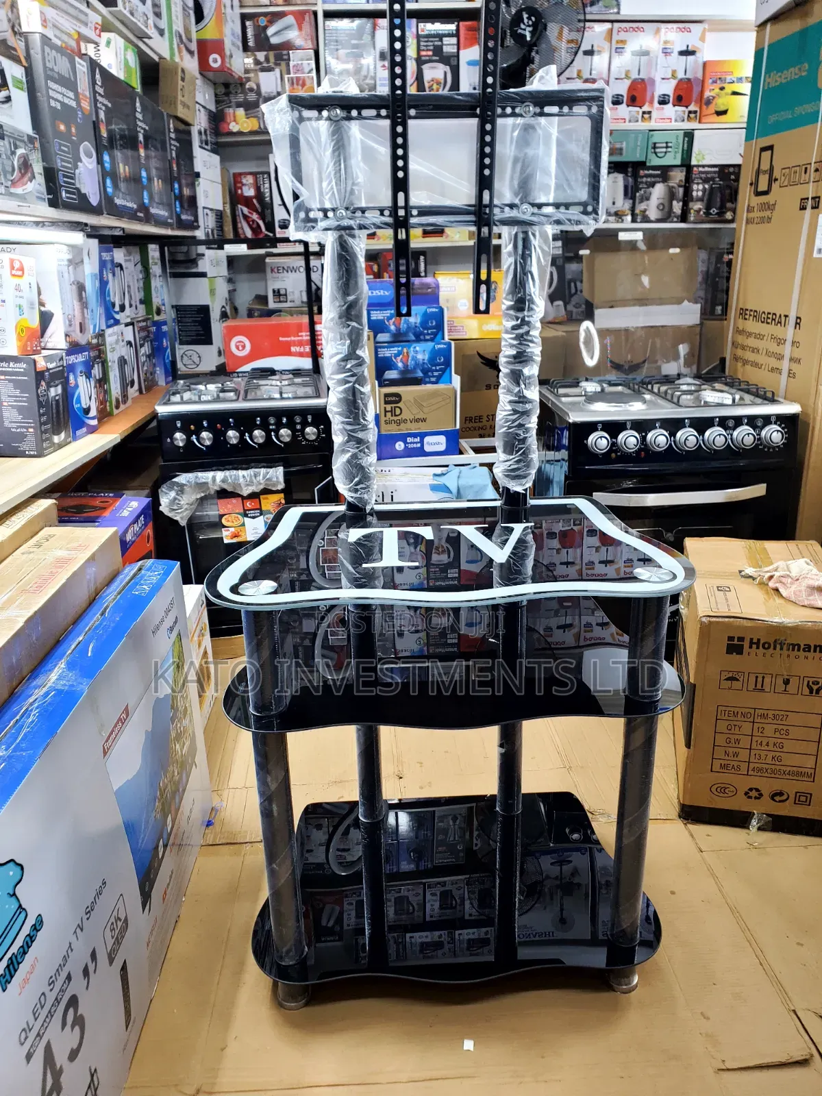 Glass TV Stand With a Built-in TV Mount Bracket