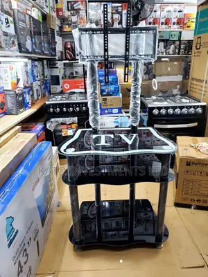 Glass TV Stand With a Built-in TV Mount Bracket