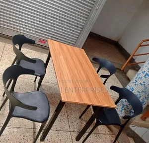 Foldable Table + 4 Curved-Back Armchairs