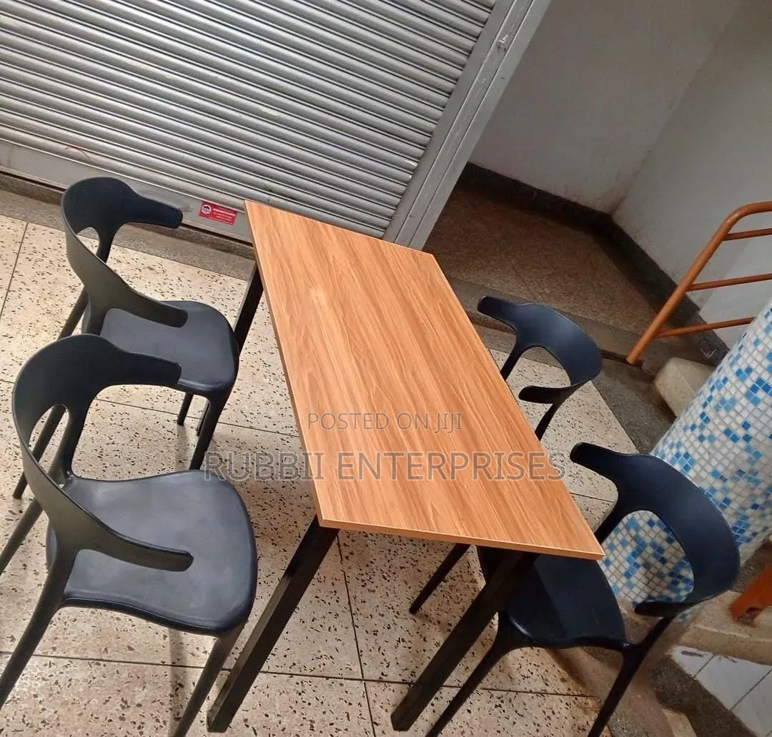 Foldable Table + 4 Curved-Back Armchairs
