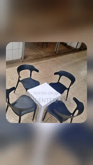 1 Small White Table + 4 Curved - Back Arm Chairs