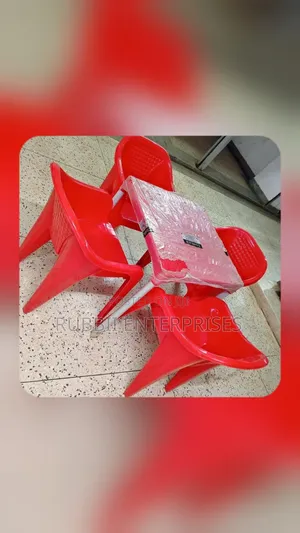 1 Red Table + 4 Molded Plastic Arm Chair