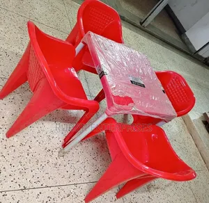 1 Red Table + 4 Molded Plastic Arm Chair