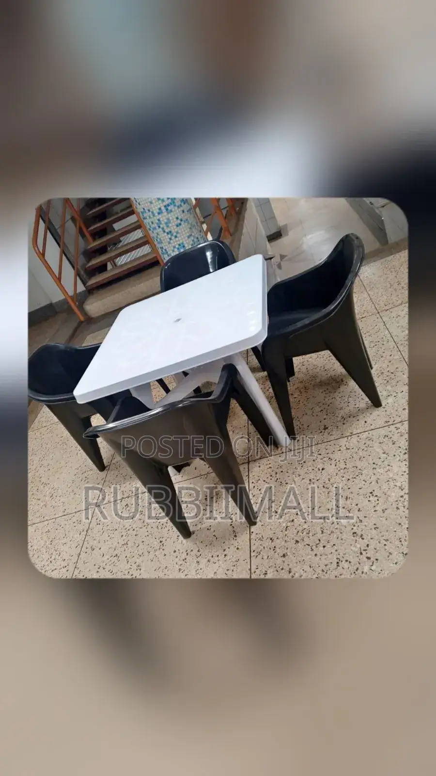 1 White Table + 4 Molded Plastic Arm Chair