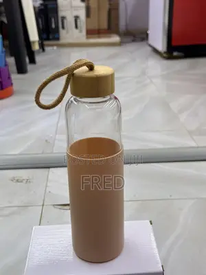 Peach-Sleeved Glass Water Bottle