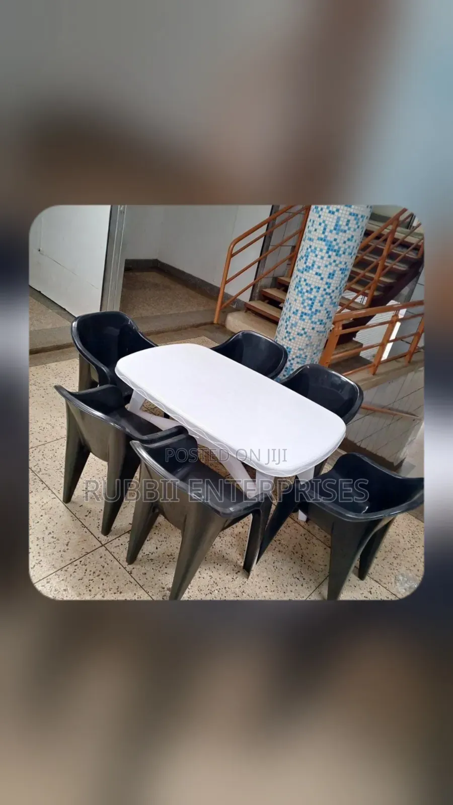 1 White Oval Table + 6 Molded Plastic Arm Chair