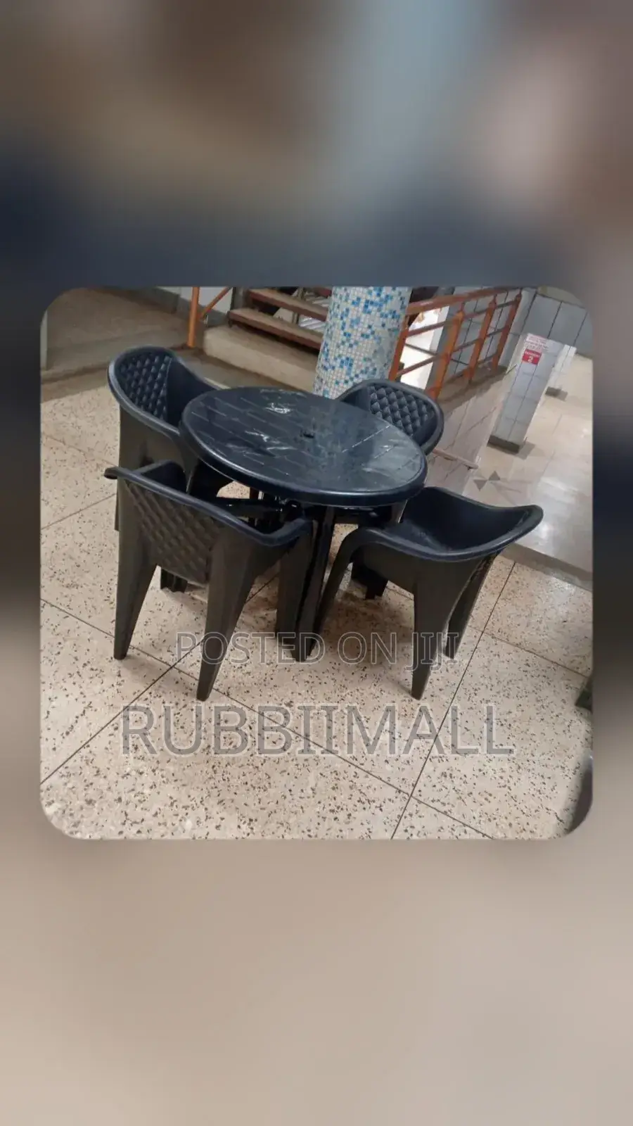 1 Round Table + 4 Molded Plastic Arm Chair