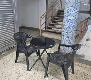 Foldable Bistro Table + Mesh-Pattern Plastic Arm Chair