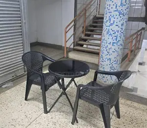 Foldable Bistro Table + Mesh-Pattern Plastic Arm Chair
