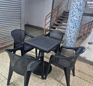 1 Small Square Table + 4 Mesh - Pattern Plastic Arm Chair