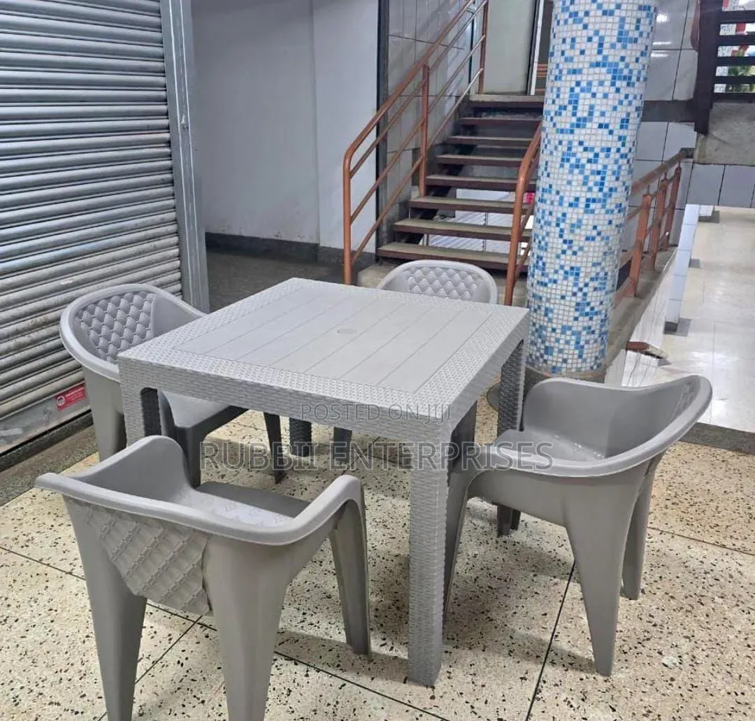 1 Grey Square Table + 4 Molded Plastic Arm Chair