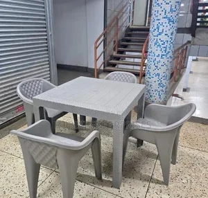 1 Grey Square Table + 4 Molded Plastic Arm Chair