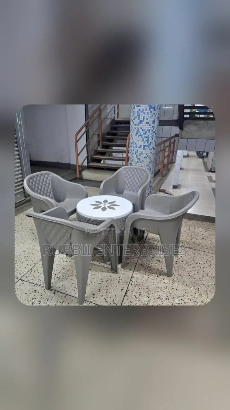 1 Round Plastic Patio Table + 4 Molded Plastic Arm Chair
