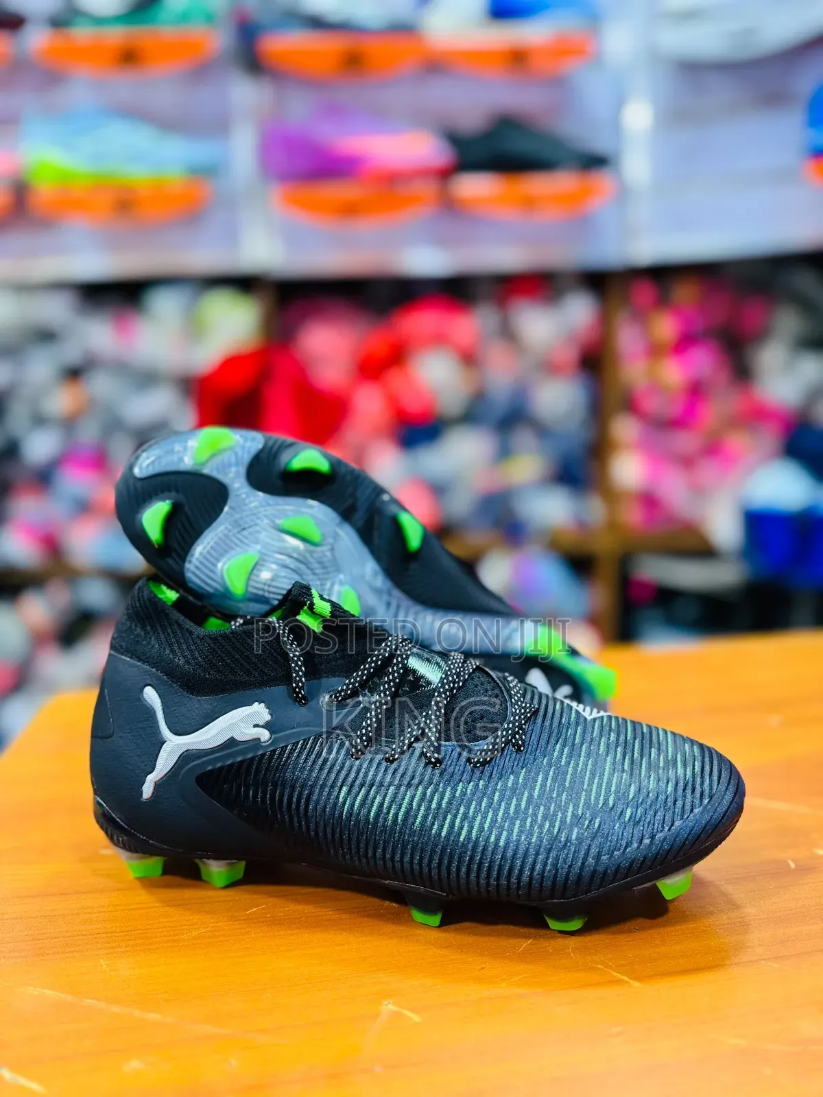 Puma Future 8 Ultimate FG in the Black, Cool Grey, and Fluo Green