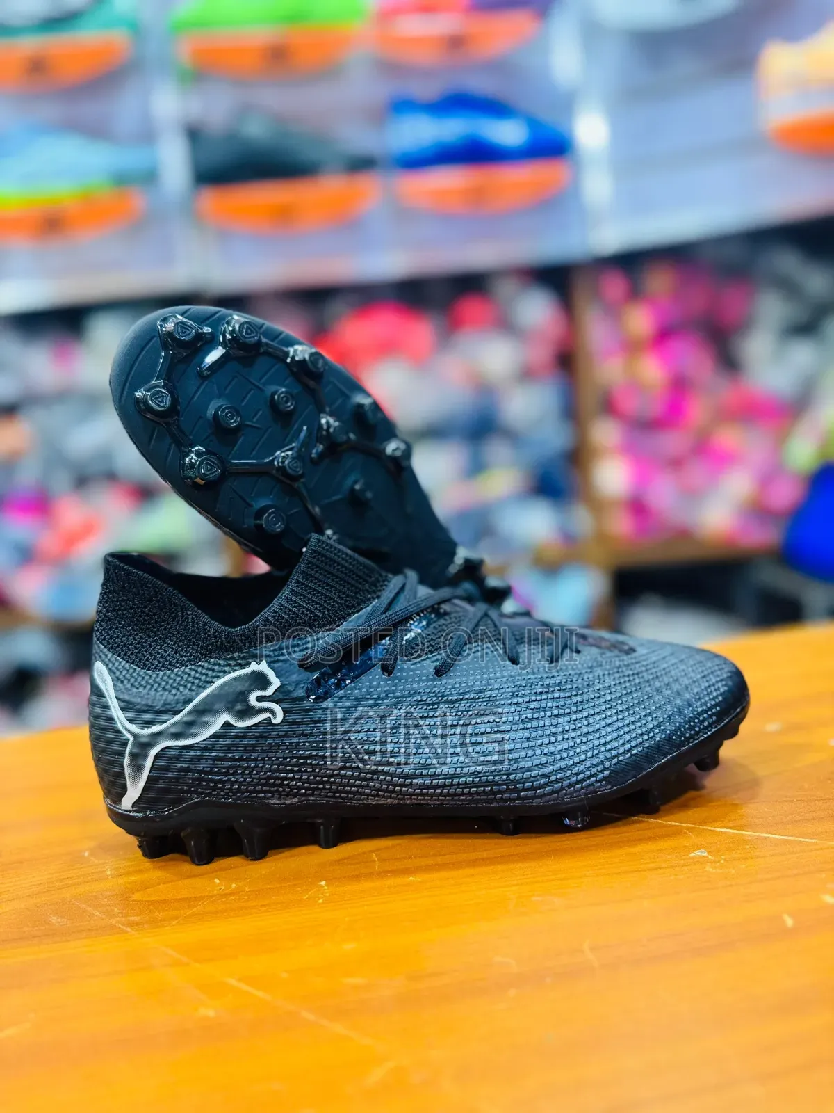 Puma Future 7 Ultimate FG/AG Soccer Cleats in the Black and Silver