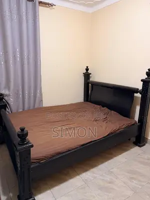 Wooden Mahogany Bed 5 by 6 (Without the Mattress)
