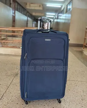 Four-Wheel Set of Navy Blue Softshell Spinner Suitcases