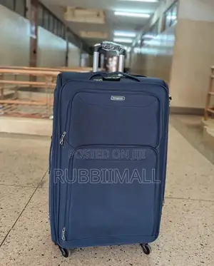 Four-Wheel Set of Navy Blue Softshell Spinner Suitcases