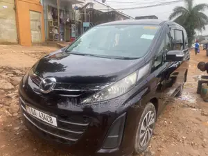 Mazda Biante 2013 Beige