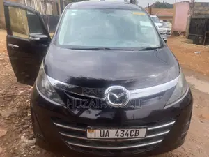 Mazda Biante 2013 Beige