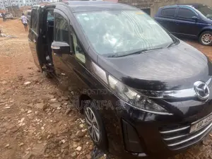 Mazda Biante 2013 Beige