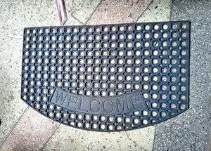 Heavy-Duty, Anti-Slip Curved Black Rubber "WELCOME" Doormat.