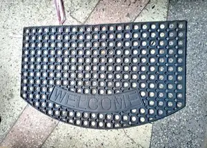 Heavy-Duty, Anti-Slip Curved Black Rubber "WELCOME" Doormat.