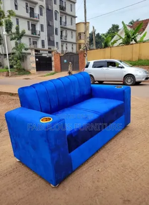 Bright Blue Sofa With Corduroy/Ribbed Fabric Holstery.