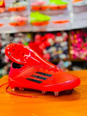 Adidas F50 Elite Football Boots in a Striking Solar Red and Black