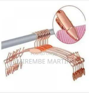 Set of 5 Rose Gold Metal Hangers With Clips