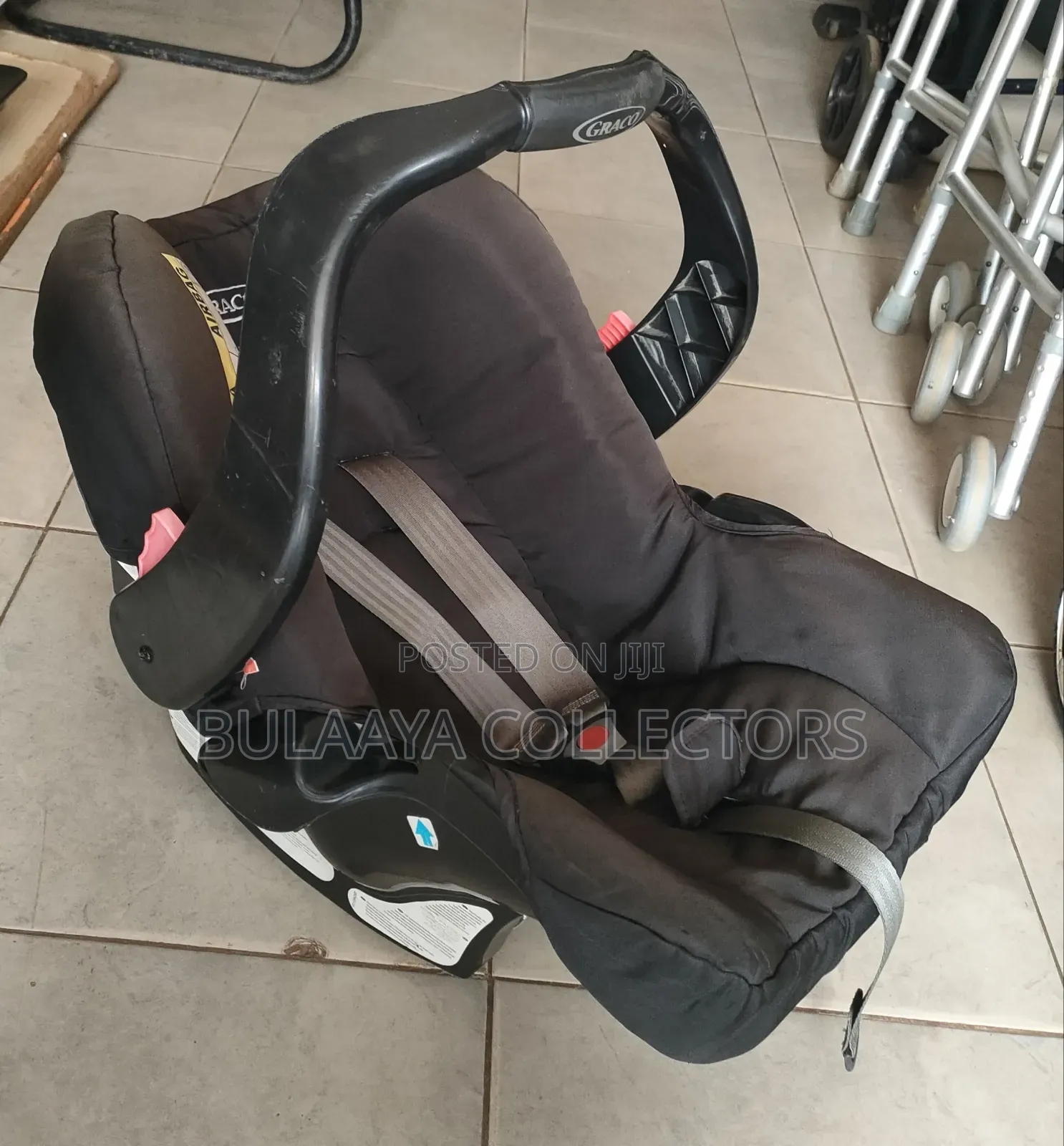 UK Used Black Graco Junior Rear-Facing Infant Car Seat.