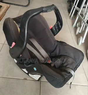 UK Used Black Graco Junior Rear-Facing Infant Car Seat.