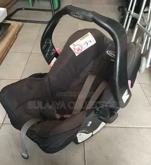 UK Used Black Graco Junior Rear-Facing Infant Car Seat.