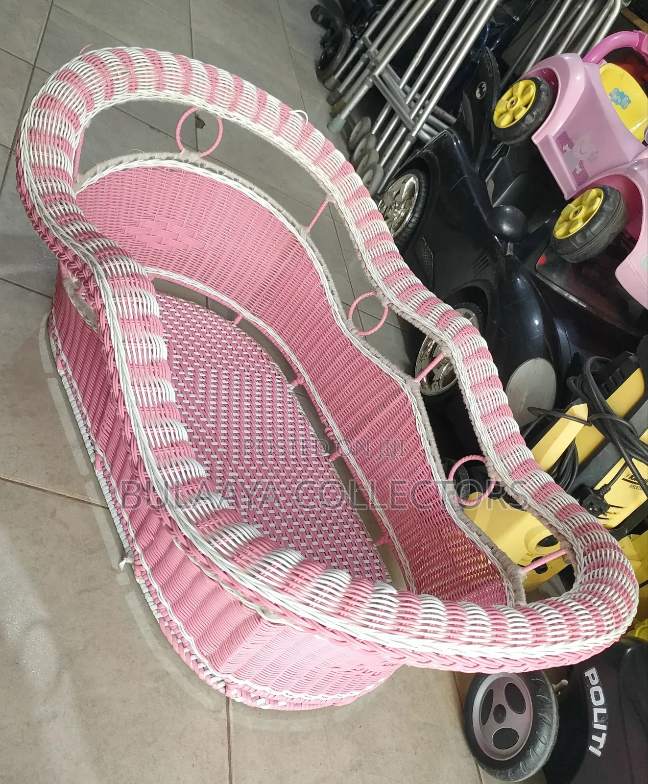 UK Used Pink and White Woven Wicker Baby Bassinet.
